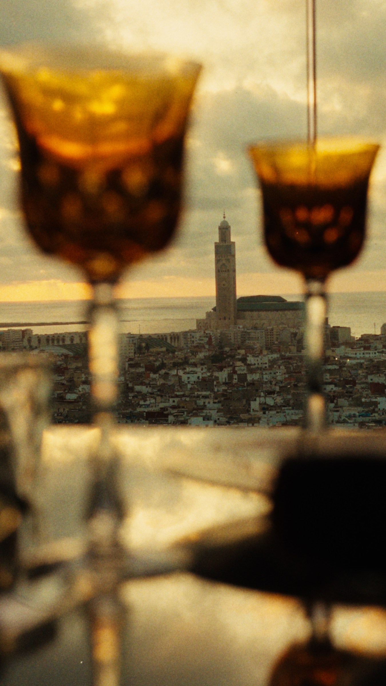 Two drinks framing the Casablanca skyline at sunset.