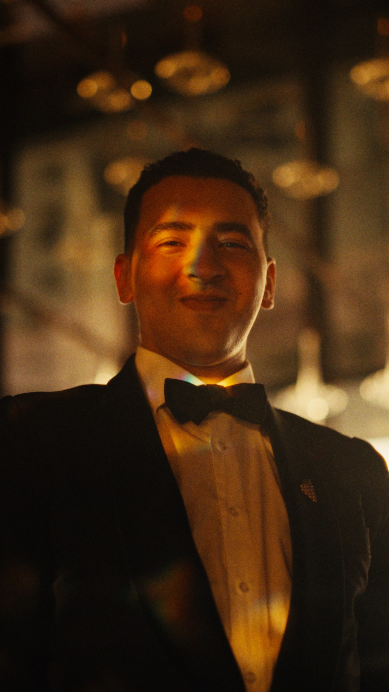A member of the Royal Mansour team beneath the evening lights.