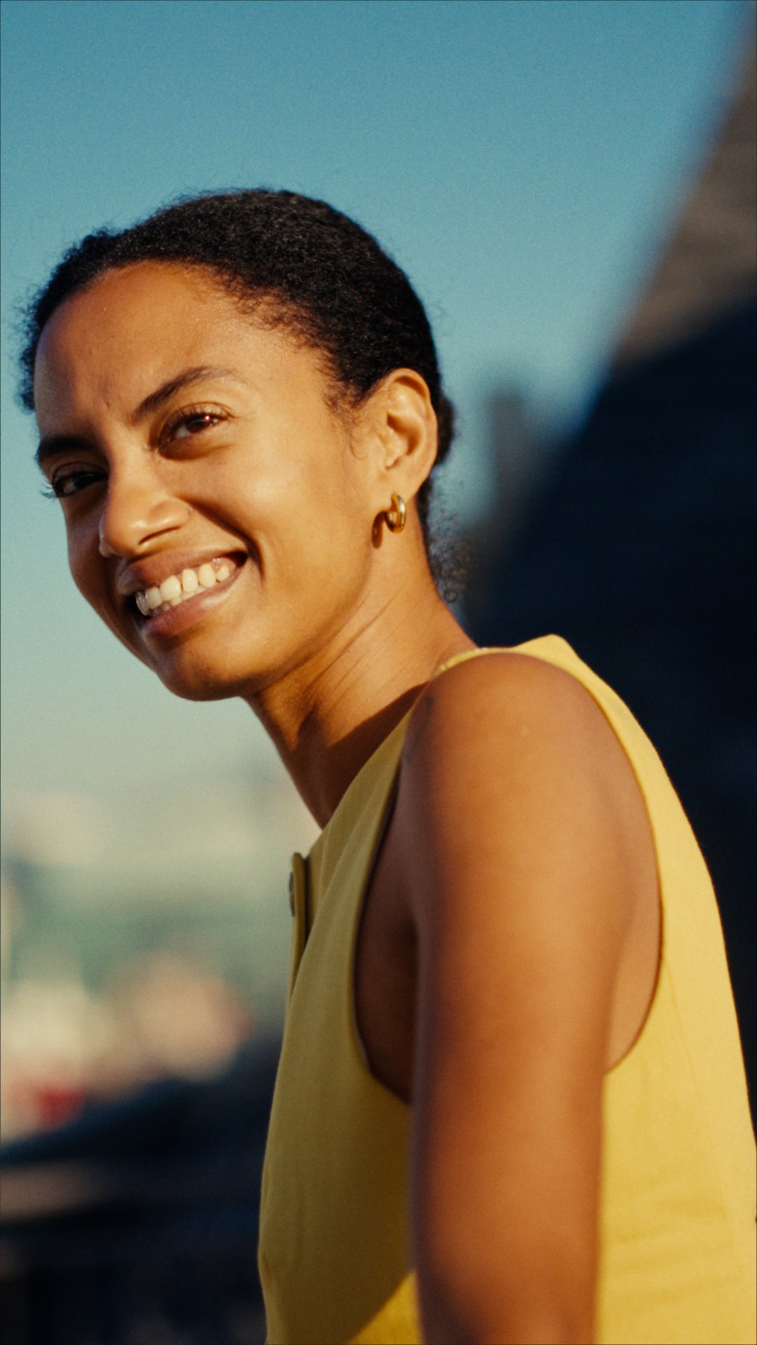 Yaye smiling beside Cape Town’s waterfront