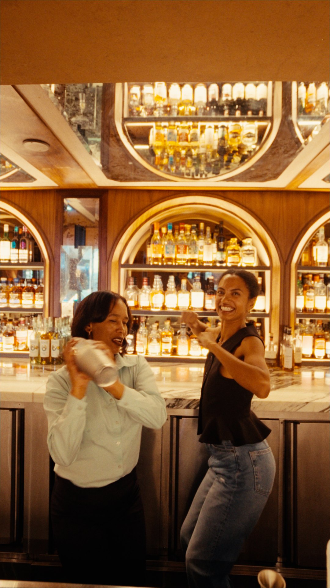 Yaye shaking a cocktail with the Bascule Bar team